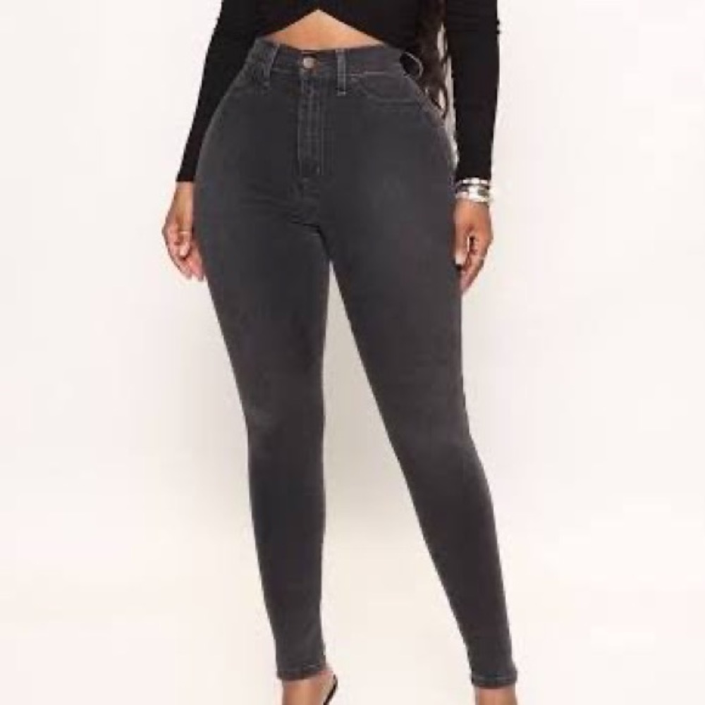 Mid to high rise washed out black skinny jeans